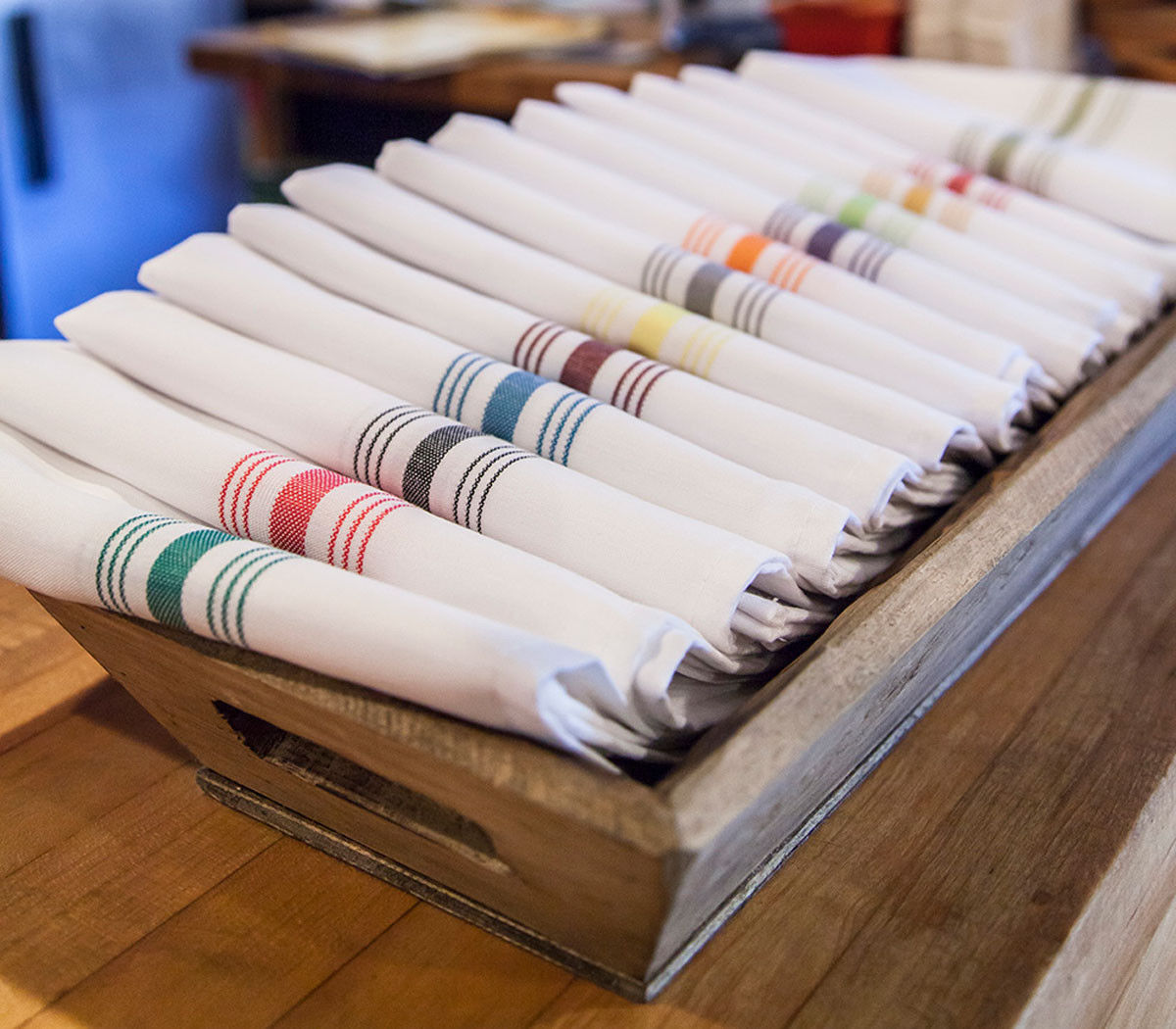 What is the color of the stripe on the napkin?