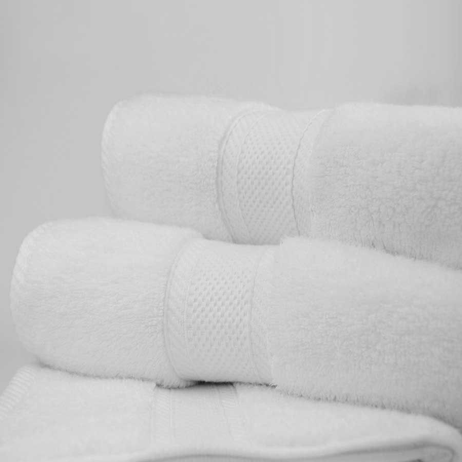 How can one truly experience the texture and softness of Oxford Miasma Towels?