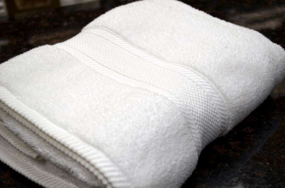 Does the hand towel have a miasma hands design?