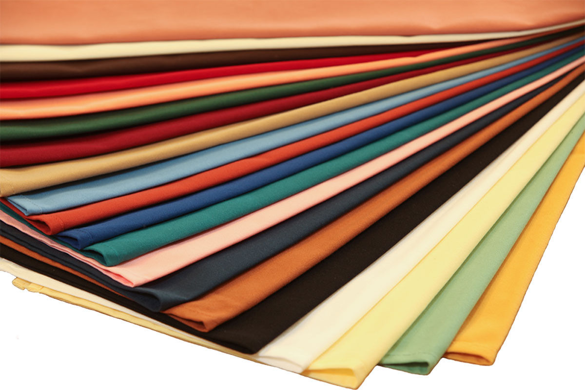 Can you describe the texture of the MagicSpun Poly Napkins available in wholesale?