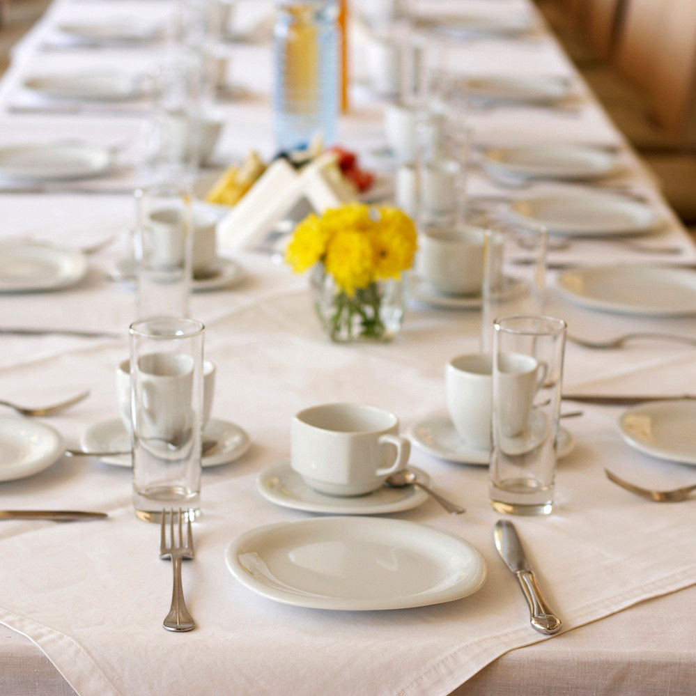 What is the fabric type of the 52x114 tablecloth from SoftSpun Rectangular Table Linen?
