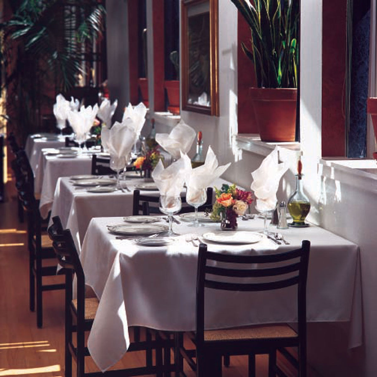 What are the benefits of these Milliken's Signature Plus table linens for restaurant owners?
