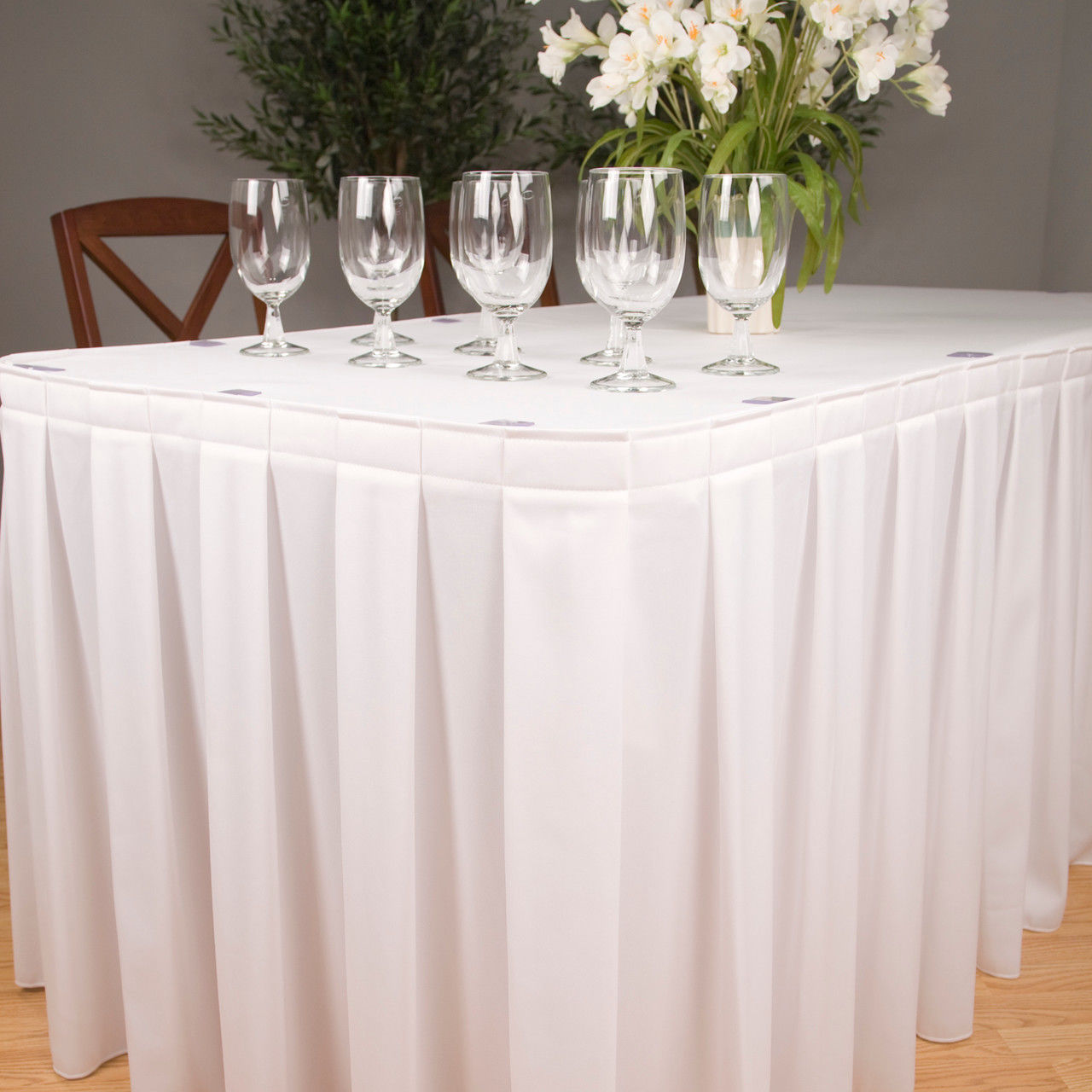 What are the key features of the Classically Tailored Round Table Skirts?