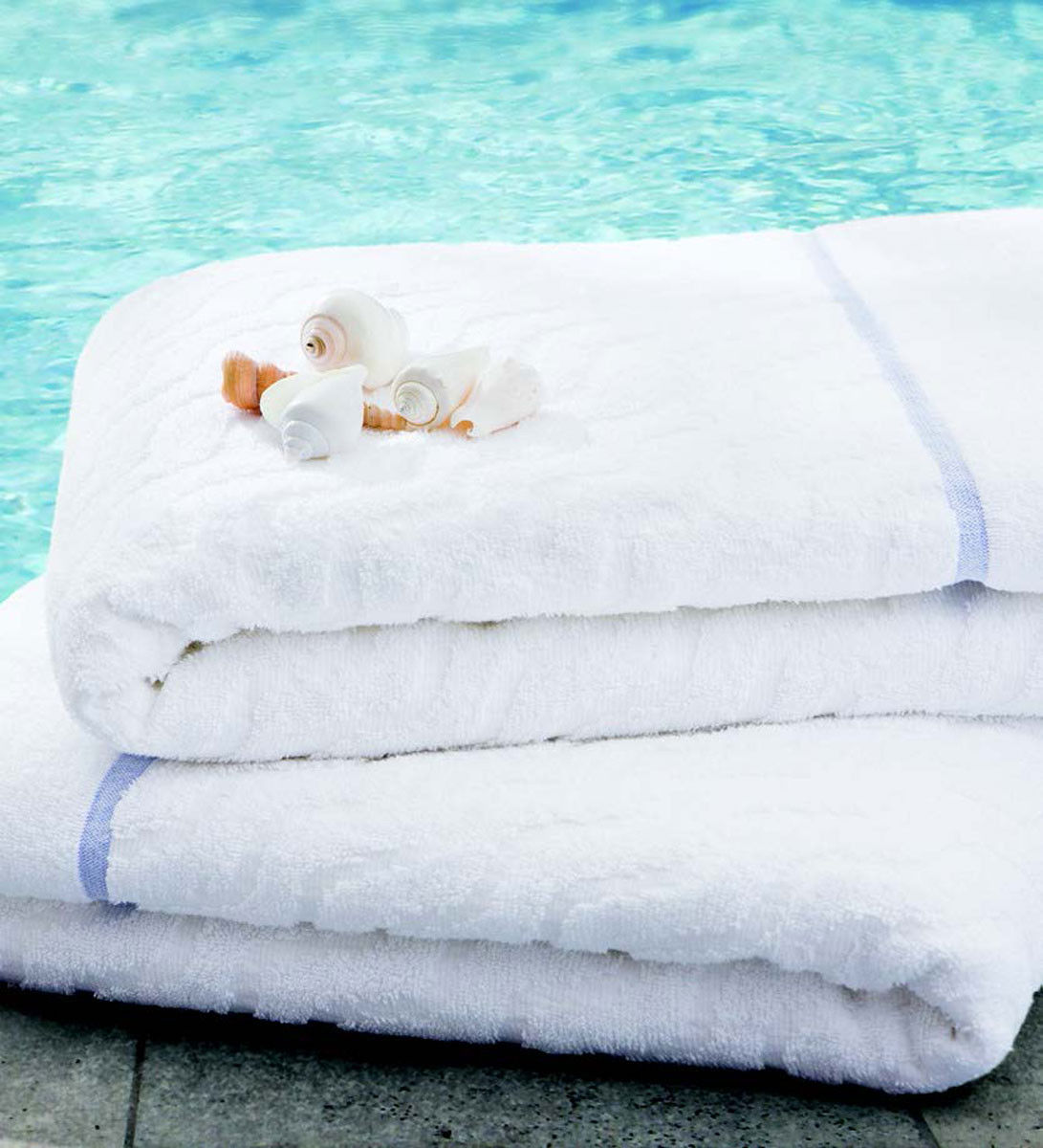What features do EuroSpa towels offer for use around the pool?
