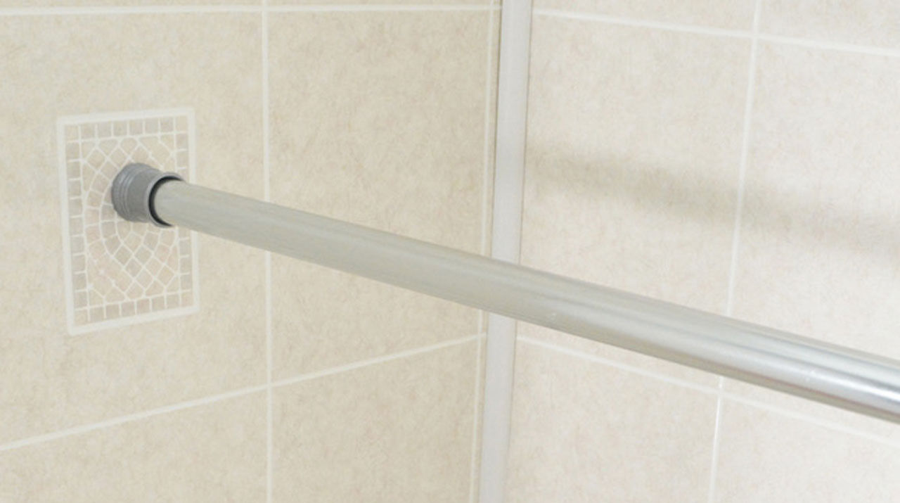 How is the 24-40 inch curved shower curtain rod designed?