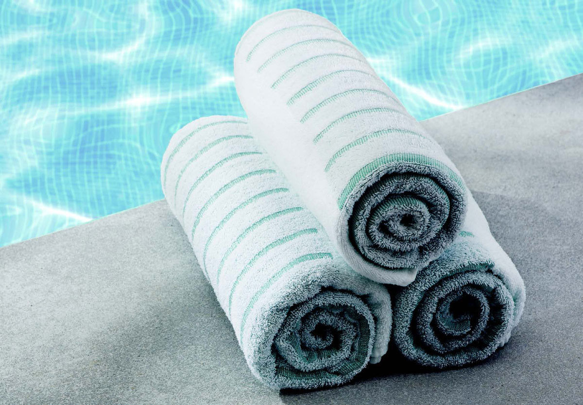 Do these white bulk beach towels have any special pool towel design features?