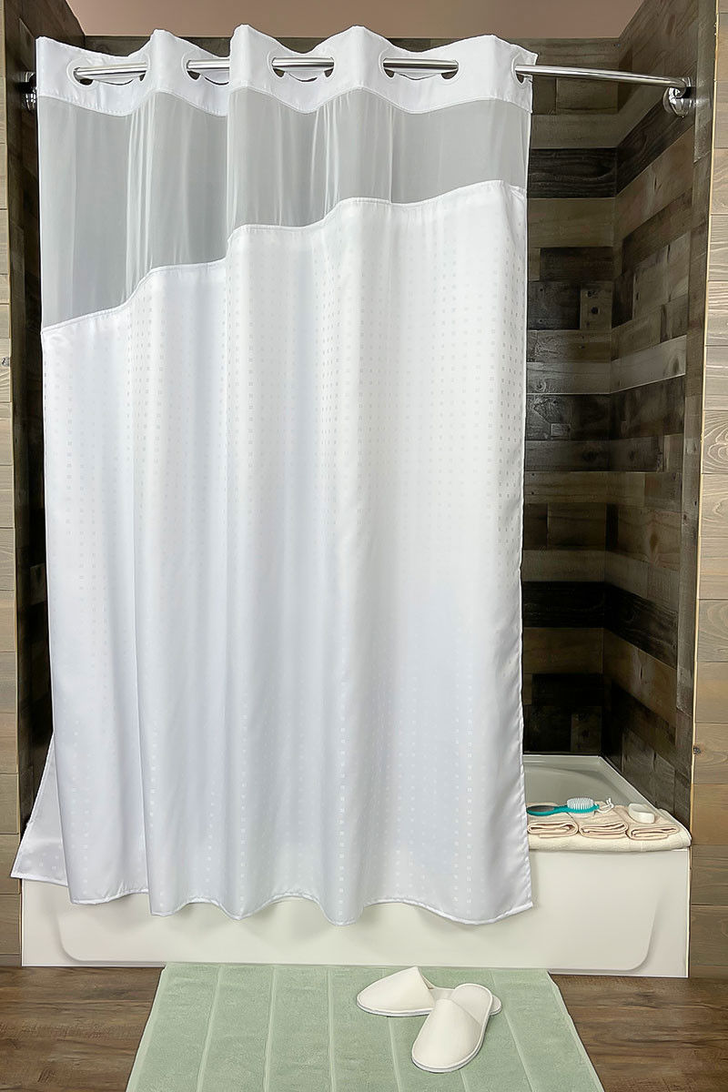 Does the Holiday Inn shower curtain by HANG2IT possess any innovative features?