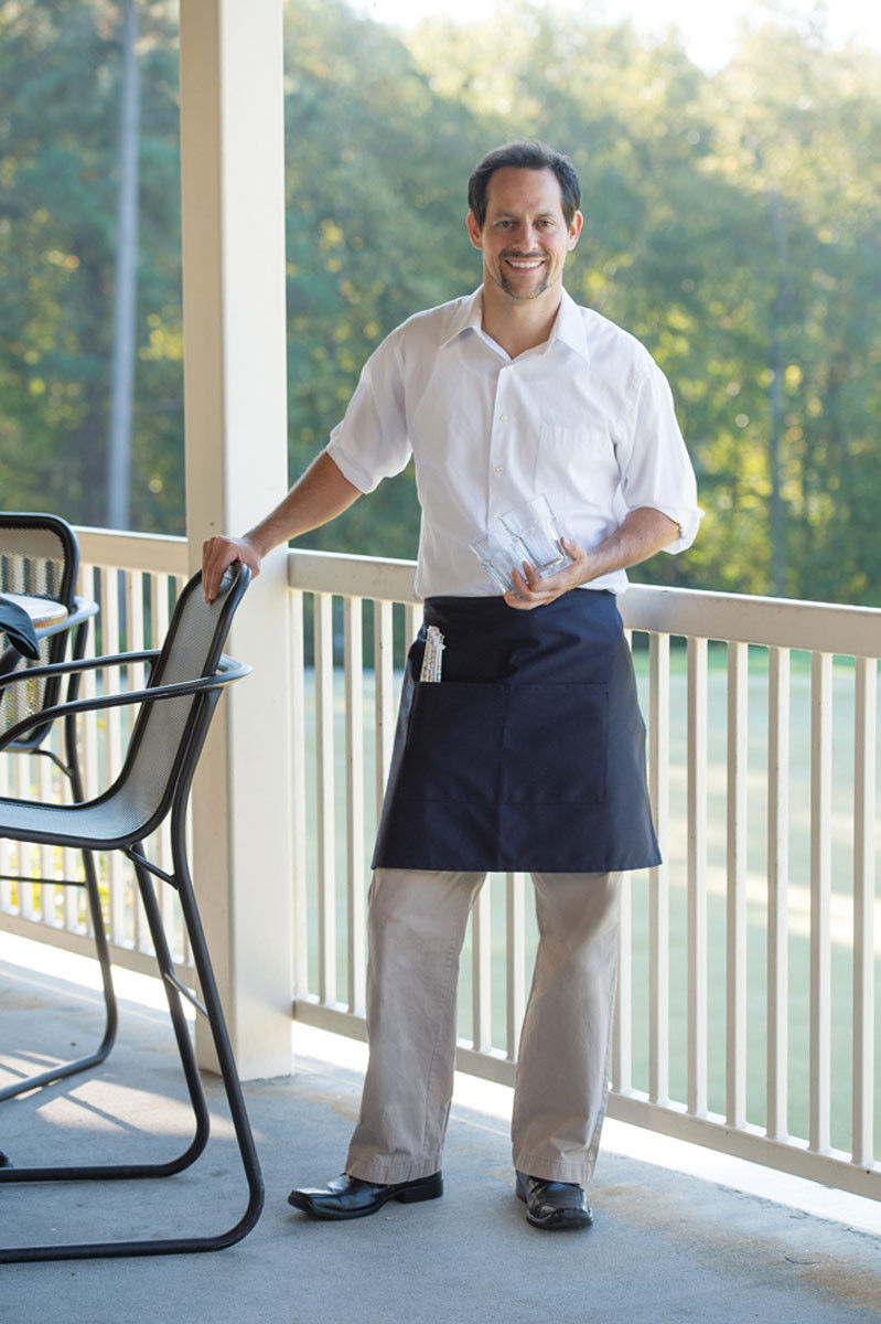 Does the half apron with pockets have any protective finish?