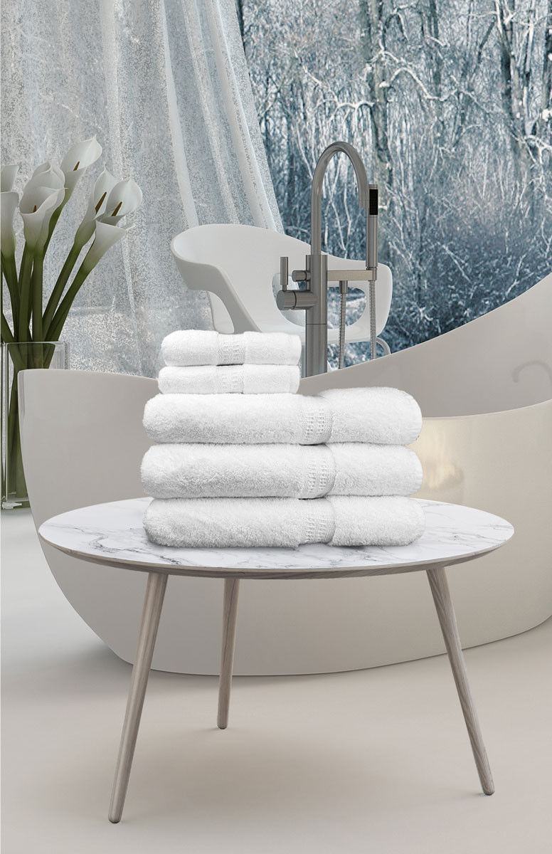 What is the benefit of washing and drying the towels?