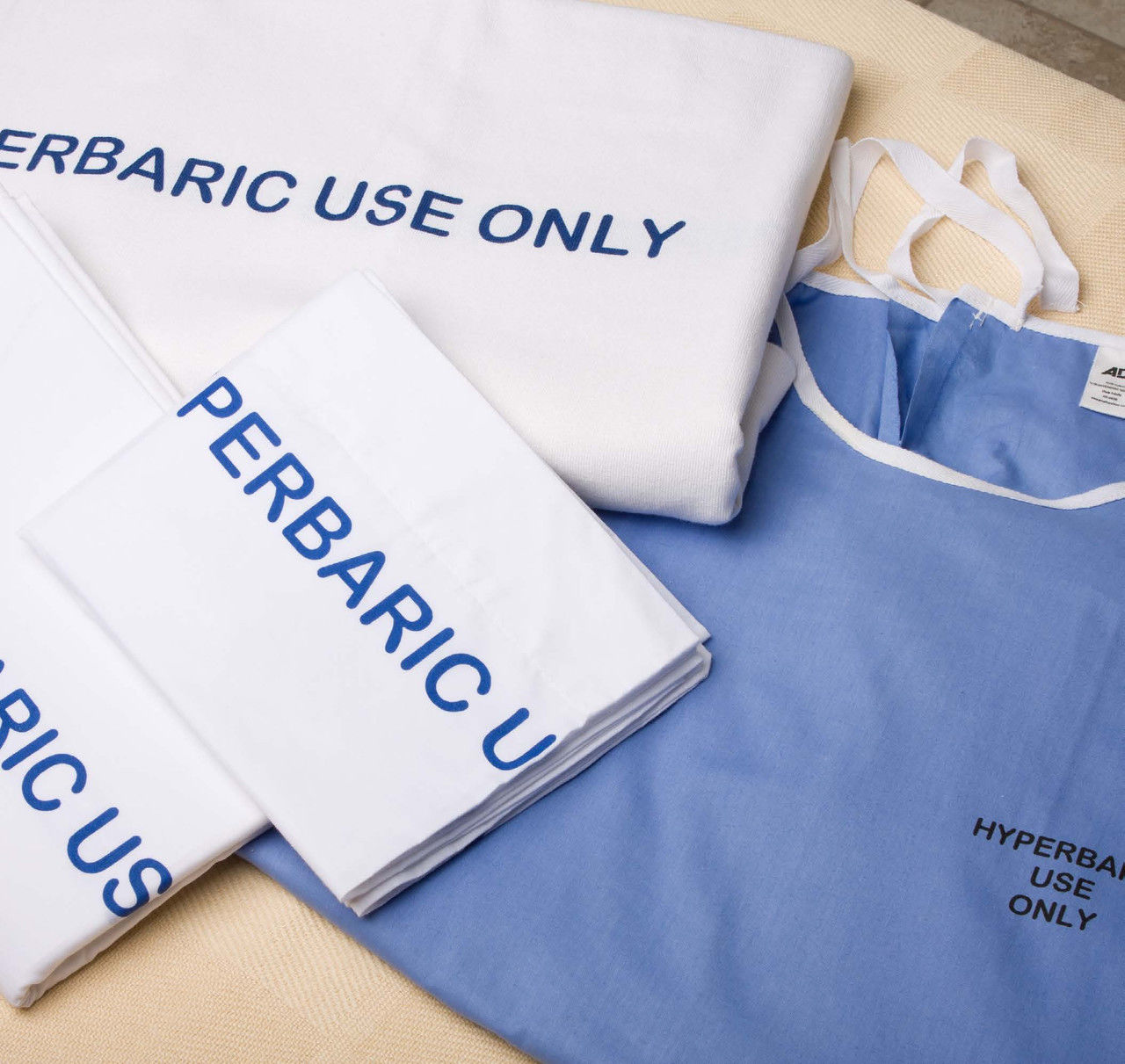 How do these Bed Sheets ensure safety and hygiene in hyperbaric environments?