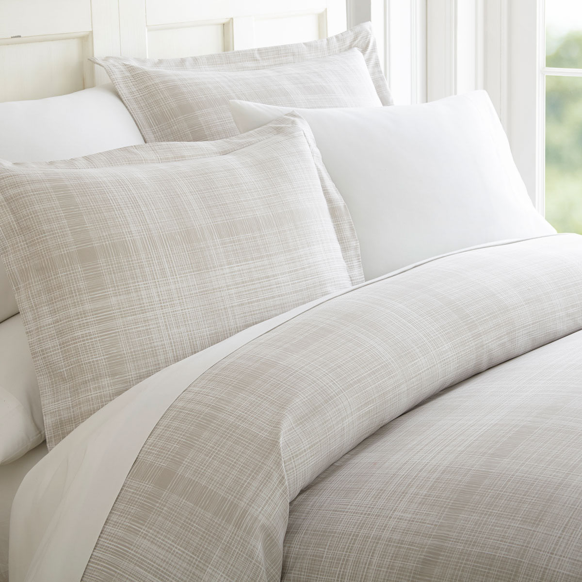 What's the size of duvet cover and pillow shams in each thatch home bedding set?