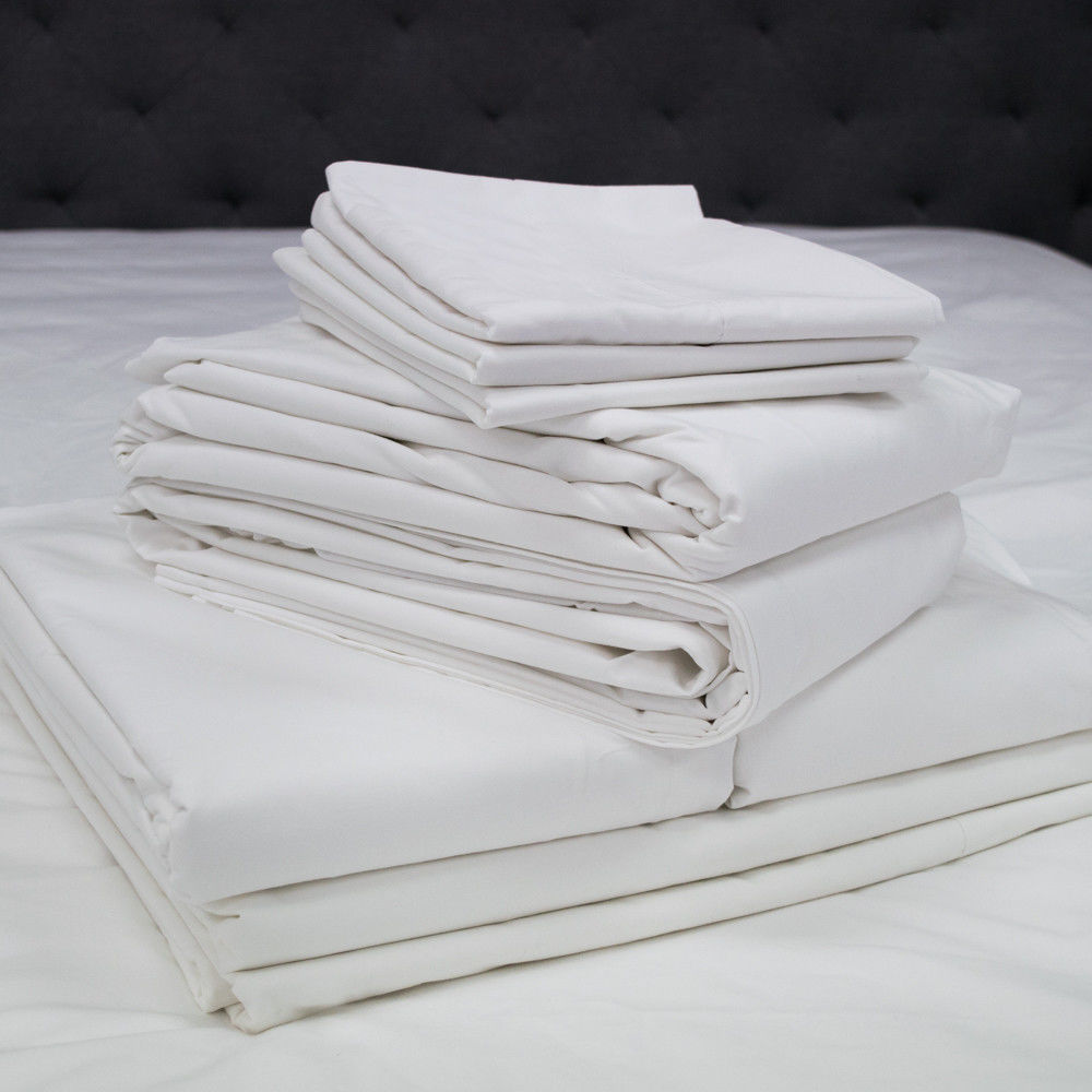 How do the materials used in the Opulence T-250 Hotel Bed linens enhance comfort and durability?