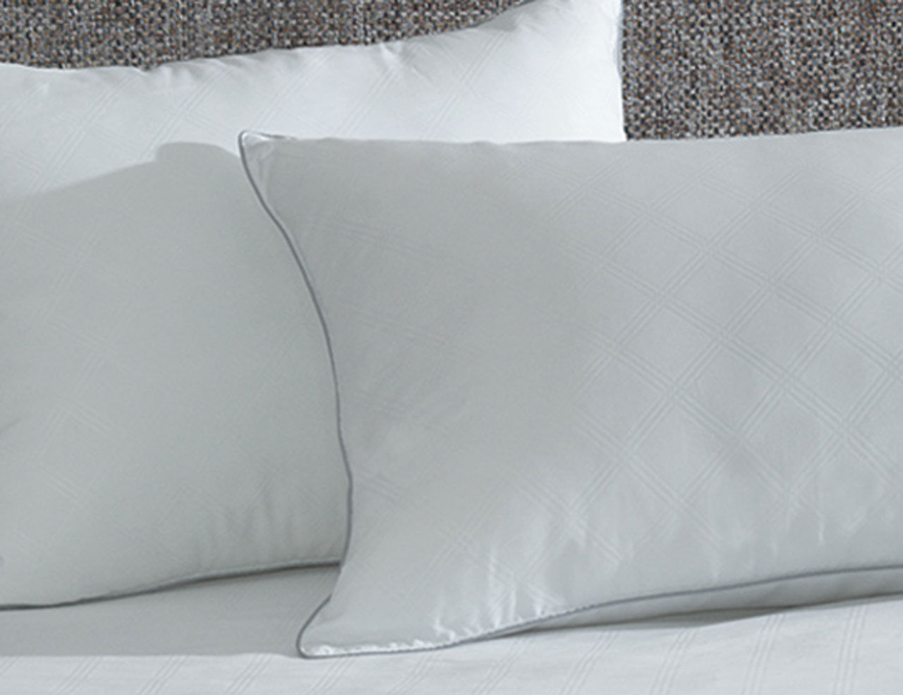 What type of fill do these AllerEase Ultimate Professional Pillows have?