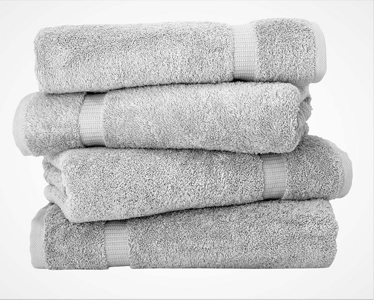 Can you describe some features of the Royal Turkish silver towels from the Villa Collection?