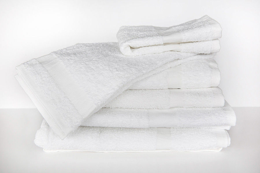 What is the material of the RSVP Towel Collection with Cam Border Towels?