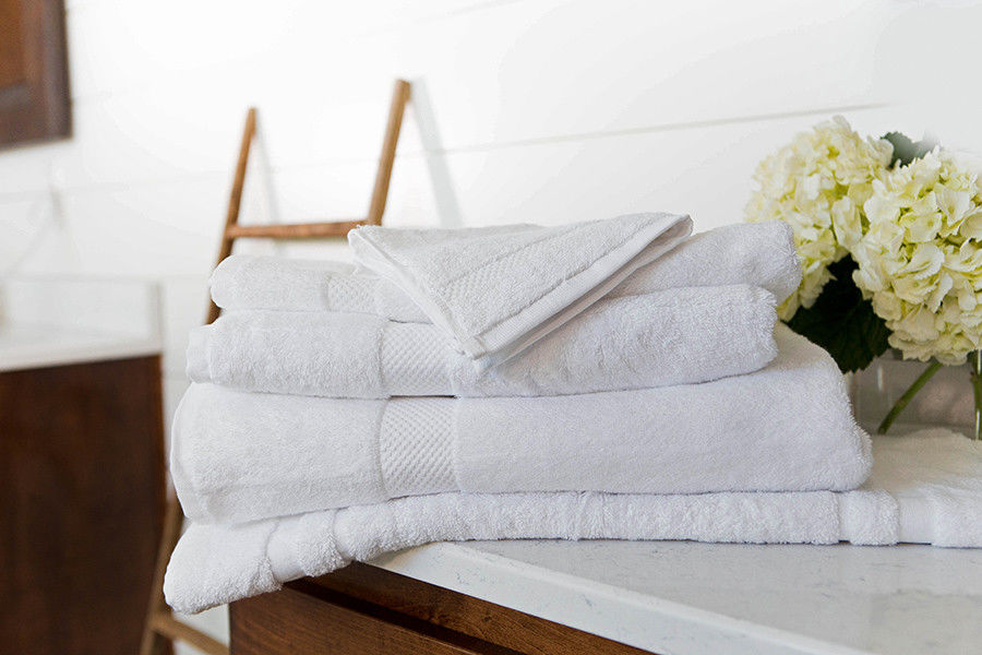 How can I maintain the softness of these luxury hotel towels?