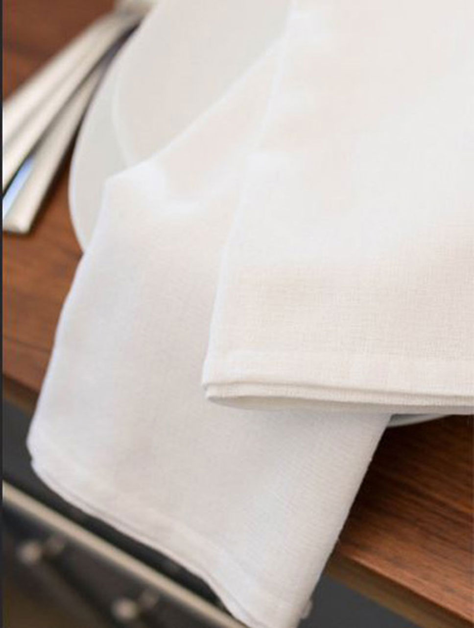 What materials compose the 100% Cotton Huck Towel and what distinguishes its features?