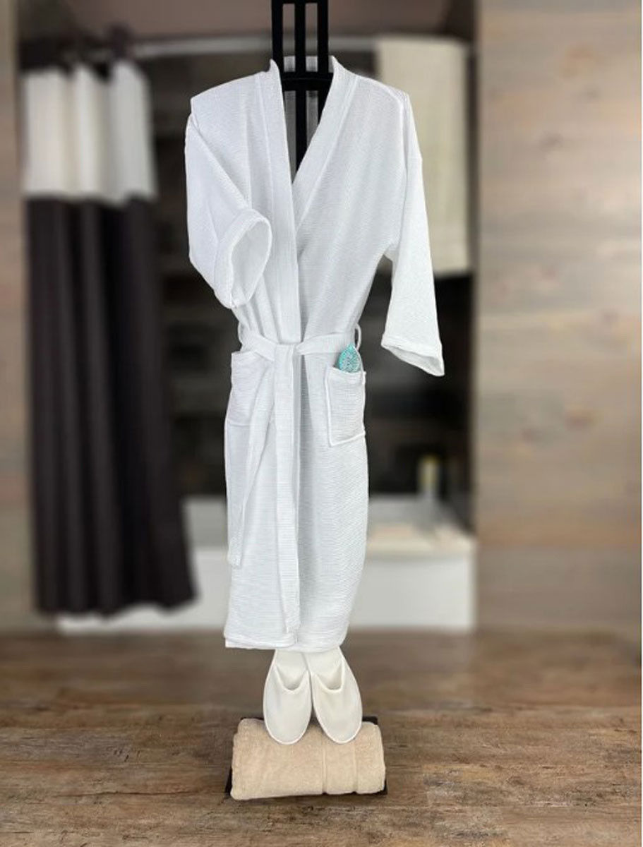 How is the bathrobe packaged for shipping?