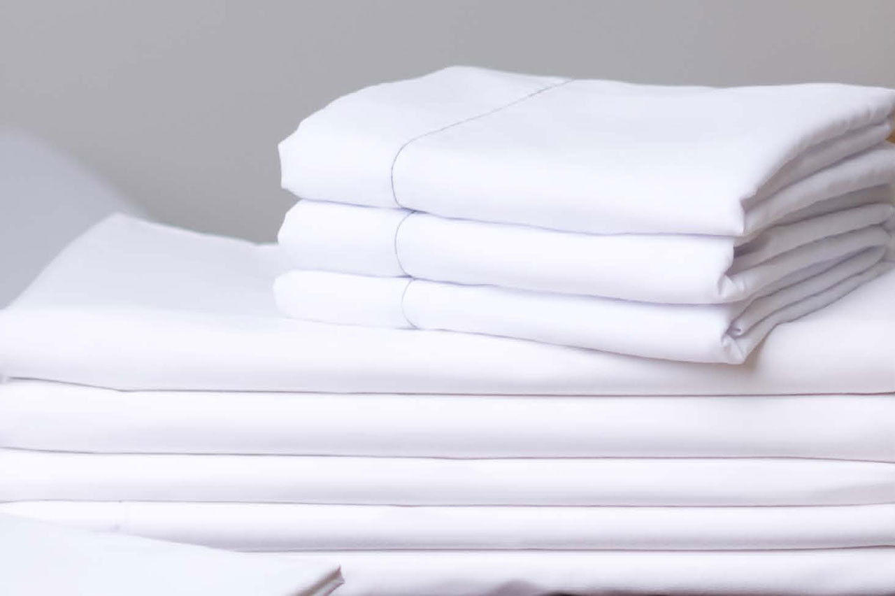 How are the sheets marked for easy laundry identification?