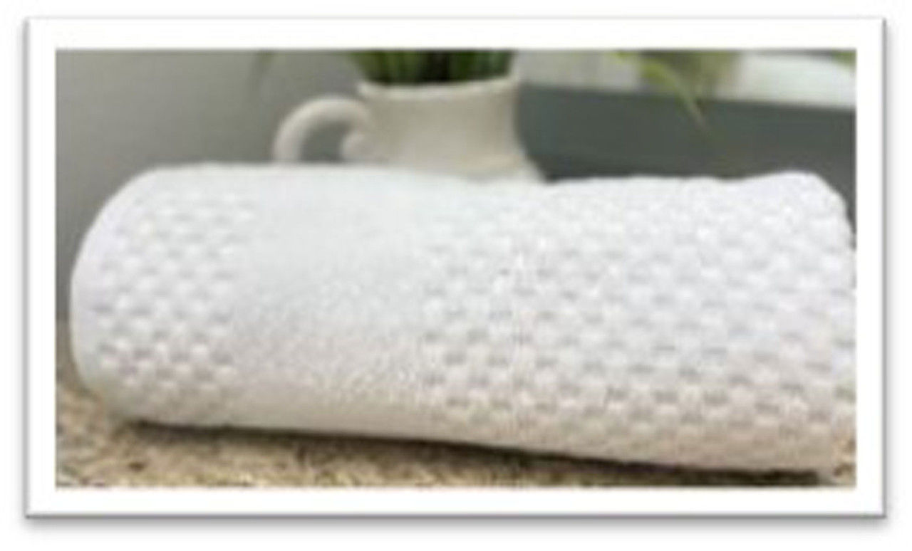 What is the texture and design of the towel?