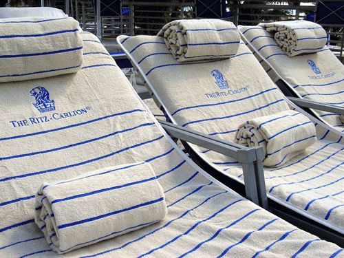 Can I customize these Ritz Pool Lounge Chair Towel Covers with my logo?