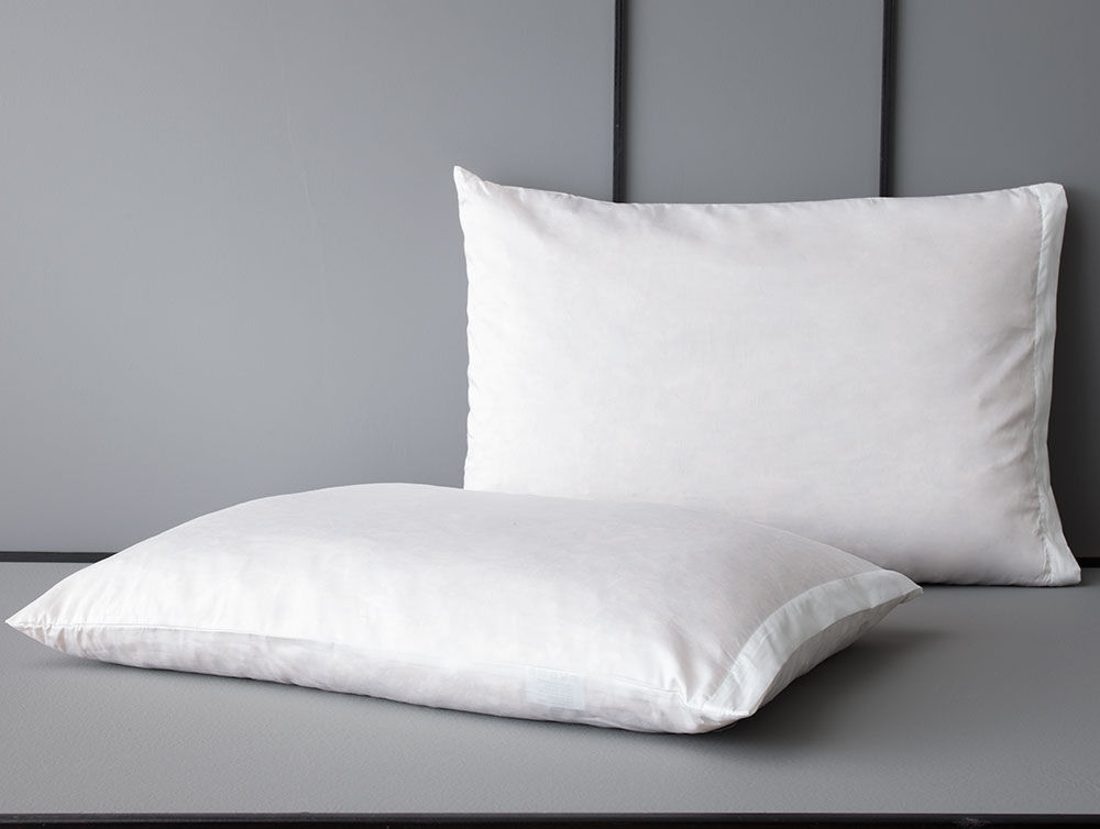 How are these feather pillows filled?